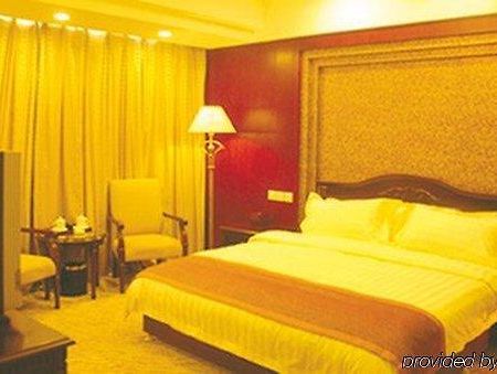 Tian Cheng Grand Hotel Zsicsao Szoba fotó